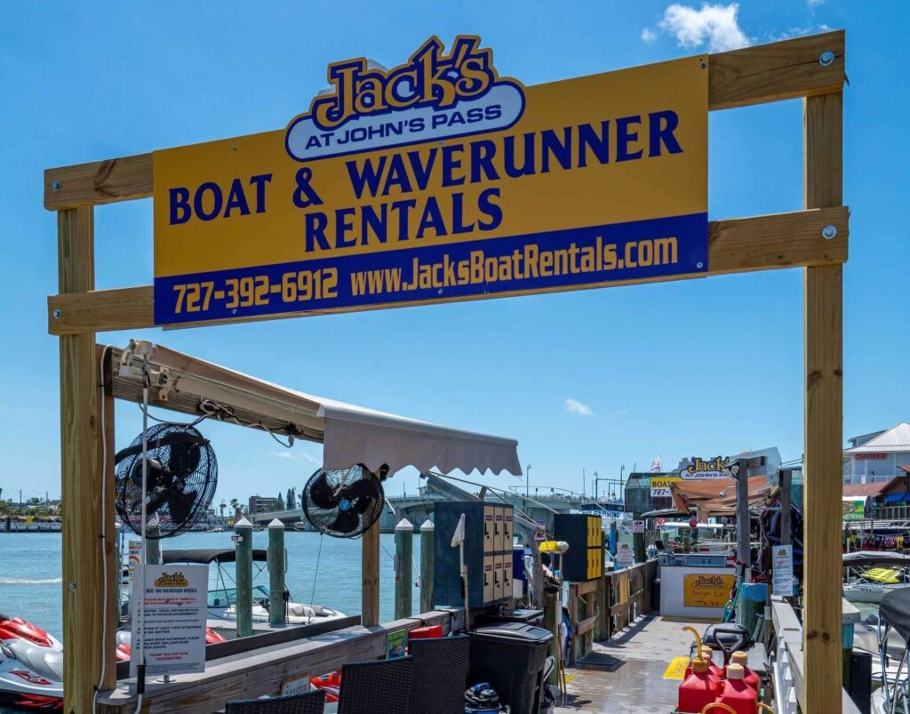 Jacks Boat Rental sign on top of the boardwalk at Johns Pass, Florida